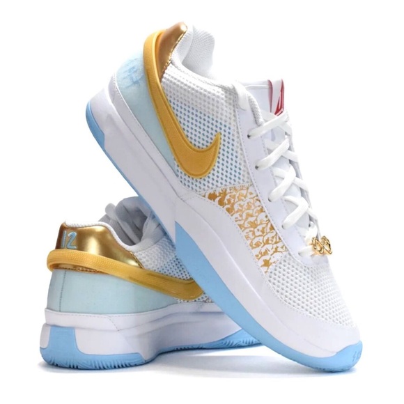 white nikes with gold